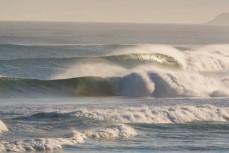 A set of waves breaks into St Kilda beach, Dunedin, New Zealand. 