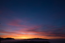 Sunrise over Otago Harbour and Otago Peninsula, Dunedin, New Zealand. 