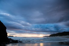 Stormy skies over Smaills Beach, Dunedin, New Zealand.