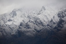 The Remarkables dusted in fresh snow as seen from Cecil Peak Station, Lake Wakatipu, New Zealand. 