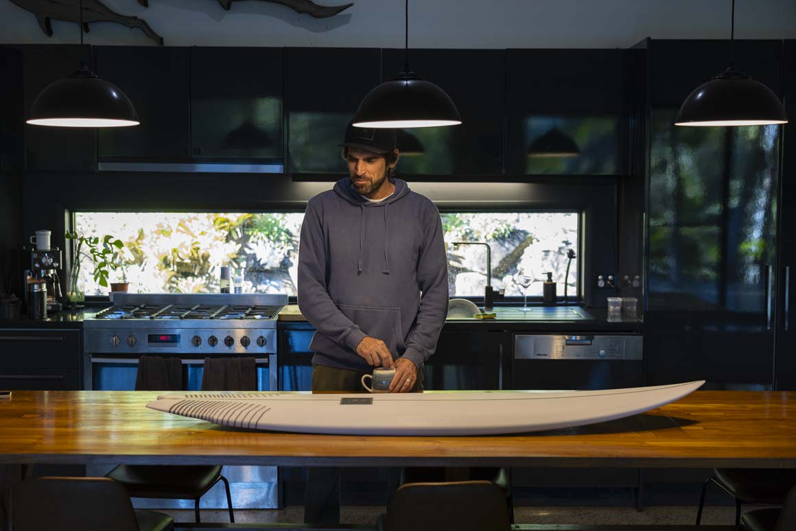 Scotty in his Gold Coast home with a new board for Kelly