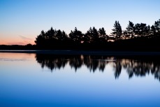 Sunset over the Kaikorai Lagoon near Waldronville, Dunedin, New Zealand. 