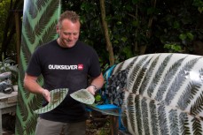 Jeremy Buis with two of his fern laminated fins in his shaping bay in his garden, Dunedin, New Zealand. 
