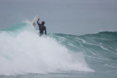 Lyndon Fairbairn makes the most of waves during a session at Blackhead Beach, Dunedin, New Zealand. 