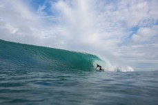 Brtett Wood rides a hollow wave during a surf at a beach in Raglan, Waikato, New Zealand. 