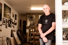 Barrie Rogerson (aka BRex) at his gallery in town, Raglan, New Zealand. 
