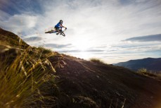 Kelly McGarry floats a section on the Rude Rock trail, Coronet Peak, Queenstown, New Zealand. 