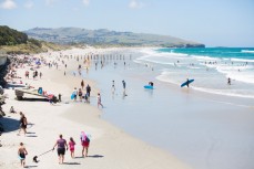 Crowds escape the summer heat at St Clair Beach, Dunedin, New Zealand. 