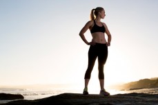 Sprinter Larissa Dyke relaxes on a beach near Brighton, Dunedin, New Zealand. 
