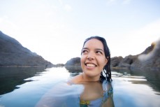 Ahilapalapa swims in the Mermaid Pool near Matapouri Bay, Northland, New Zealand. 