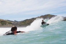 Sam Guthrie grabs his rail during a cutback on a wave during a peaky east swell at Blackhead Beach, Dunedin, New Zealand. 
