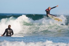 JC Susan airs on a wave at Blackhead Beach, Dunedin, New Zealand. 