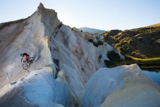 One ot the world's leading enduro MTB racers, Kiwi Jamie Nicoll, explores St Bathans during a post-training play riding session, Central Otago, New Zealand. 