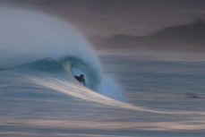 Will Lewis gets barreled in playful waves at Blackhead Beach, Dunedin, New Zealand. 