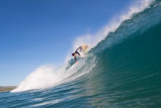 Jess Carerra launches out of the lip on a hollow wave at St Kilda Beach, Dunedin, New Zealand. 