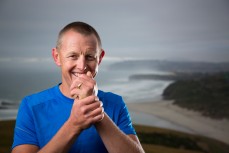 Ultra distance trail runner Glenn Sutton during an early morning training run on the Karetai Track, Dunedin, New Zealand. 