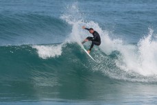 Josh Thickpenny revels in playful conditions at Blackhead Beach, Dunedin, New Zealand. 