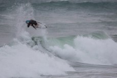 Leroy Rust boosts above it all in playful conditions at Blackhead Beach, Dunedin, New Zealand. 