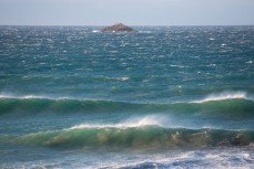 Wild wind blasts the ocean at St Clair, Dunedin, New Zealand. 