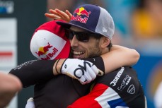 Sister and brother Rachel and Gee Atherton, of Great Britain, hug each other after winning the women's and men's downhill at the 2014 Cairns UCI MTB World Cup held in Tropical North Queensland, Queensland, Australia. 