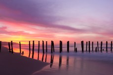 Dawn over the St Clair Poles at St Clair Beach, Dunedin, New Zealand. 