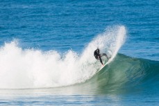 Ace on a fun, glassy day at Poles, St Clair Beach, Dunedin, New Zealand. 