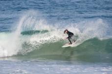 Nick Rapley shifts some water on a fun, glassy day at Poles, St Clair Beach, Dunedin, New Zealand. 