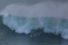Nick Smart revels in large surf at a reef break near Papatowai, Catlins, New Zealand. 