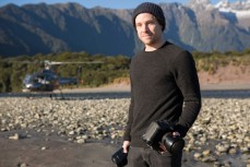 Photographer Vaughan Brookfield on Transit Beach on the West Coast of the South Island, New Zealand. 
