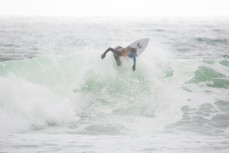 Mt Maunganui surfer Jordan Griffin revels in light onshore waves at Manu Bay, Raglan, New Zealand. 