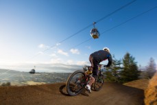 James Walter rides a trail beneath the gondola at Skyline Rotorua, Rotorua, New Zealand. 