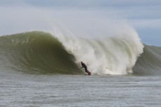 Jamie Gordon rides a solid wave at the Southern Slab in the Catlins, Southland, New Zealand. 