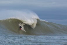 Tom Bracegirdle drops into a solid wave at the Southern Slab in the Catlins, Southland, New Zealand. 