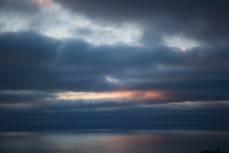 Sunrise on a stormy morning over St Clair Beach, Dunedin, New Zealand. 