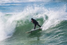 Hayley Coakes on a fun wave at St Clair Beach, Dunedin, New Zealand. 