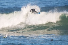 Nick Mills floats a section at St Clair Beach, Dunedin, New Zealand. 