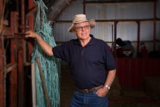Farmer Bruce Morrison in his barn on his 70th birthday, Cambridge, New Zealand. 