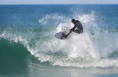 Davy Wooffindin taking the high line at Seconds Beach, Dunedin, New Zealand. 