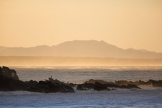 Searchers look for Jack Dixon after the 5-year-old was washed from Shelly Beach during a large swell at Mount Maunganui, Bay of Plenty, New Zealand on October 01, 2014. 