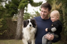 Jeremy Moon, the entrepreneur behind the Icebreaker brand, at his home in Auckland with 19-month-old son Max, and four-year-old Border collie, Molly, Auckland, New Zealand. 