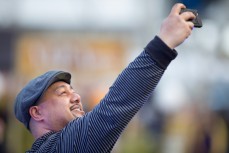 Che-Fu takes a selfie on stage at OUSA's 2014 Dunedin Craft Beer and Food Festival held at the Forsyth Barr Stadium, Dunedin, New Zealand on October 4, 2014. . 