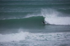 Steve Bates on a wild swell at St Clair Beach, Dunedin, New Zealand. 