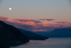 A full moon and sunset over Lake Wakatipu as seen from Mt Nicholas Station, Lake Wakatipu, New Zealand. 