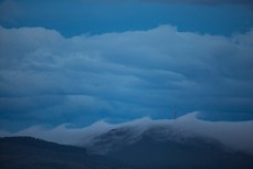 Wave cloud formations surge across Mt Cargill, Dunedin, New Zealand. 