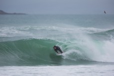 Luke Grubb rides a backhand barrel at Blackhead Beach, Dunedin, New Zealand. 