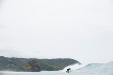 Luke Darby draws off the bottom in fun conditions at Piha North, Piha, New Zealand. 