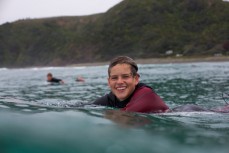 Toby Dobson-Smith (16) all smiles in good conditions at Piha North, Piha, New Zealand. 