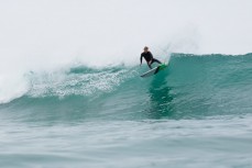 Jonas Tawharu lets loose in good conditions at Piha North, Piha, New Zealand. 
