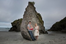 Blair and Jen Hughson with daughter Alice at a beach near Brighton, Dunedin, New Zealand. 