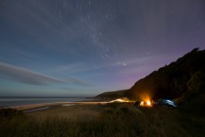 Camping at Purakaunui Bay in the Catlins, New Zealand. 